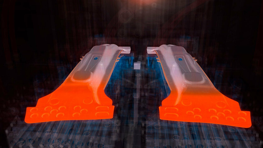 Stanz- und Umformwerkzeuge - Warmumformexpertise bei weba Werkzeugbau Illustration: Zwei B-Säulen, eingelegt und umgeformt in einem Warmumformwerkzeug. Transparent dargestellte Kühlungen des Werkzeugs. Die SoftZone-Bereiche (Tailor Tempering) der B-Säule sind orange markiert